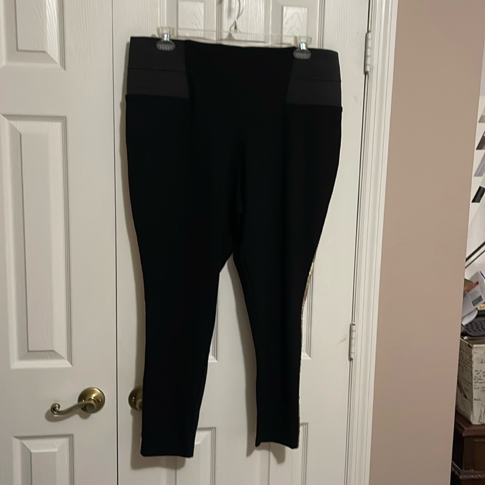 Eloquii black skinny pant with gold sequins.